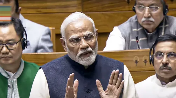 Prime Minister Narendra Modi speaks in the Lok Sabha during the discussion on the 'glorious journey of 75 years of the India Constitution', in the ongoing Winter session of Parliament, in New Delhi, Saturday, Dec. 14, 2024.