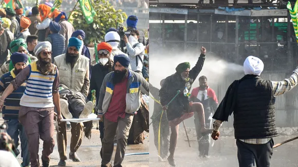 An injured farmer being carried away after security personnel fired tear gas shells to disperse agitating farmers at Shambhu border, in Patiala district, Punjab, Saturday, Dec. 14, 2024.