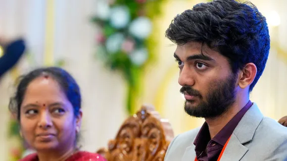 World Chess Champion Gukesh Dommaraju with his mother Padmavathi during a press conference, in Chennai, Monday, Dec. 16, 2024.