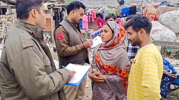 Delhi Police personnel during a campaign to identify Bangladeshi and Rohingya immigrants residing without valid documentation in New Delhi on Tuesday, Dec. 24, 2024.