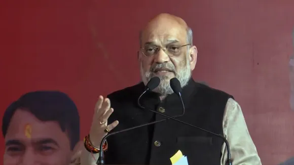 Amit Shah speaks during a public meeting for the upcoming Delhi Assembly elections, at Narela, in New Delhi on Sunday, January 26, 2025.