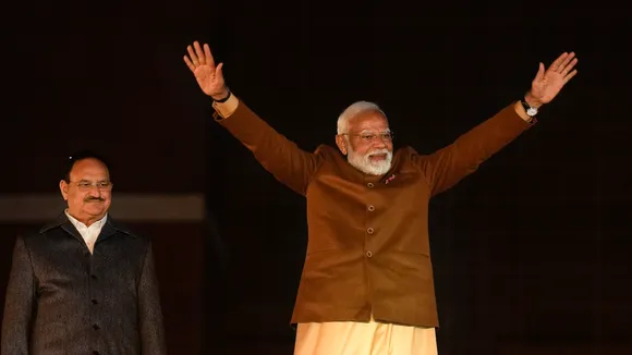 Prime Minister Narendra Modi gestures during celebrations at the BJP HQ after the party won the Delhi Assembly election in New Delhi on Saturday, Feb. 8, 2025.
