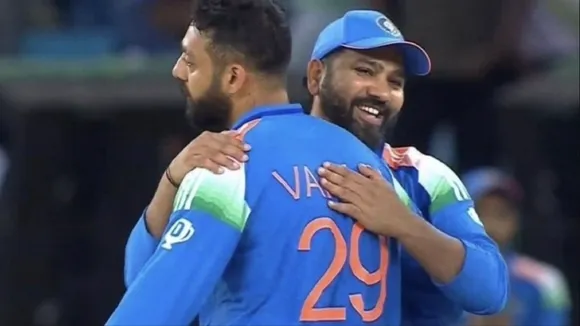 Varun Chakravarthy and Rohit Sharma
