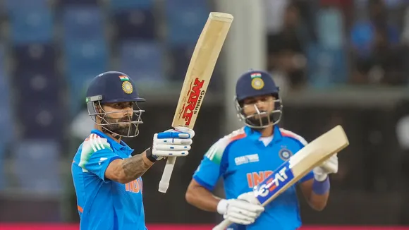 Virat Kohli celebrates his half century as Shreyas Iyer looks on during the ICC Champions Trophy semi-final cricket match between India and Australia in Dubai on Tuesday, March 4, 2025.