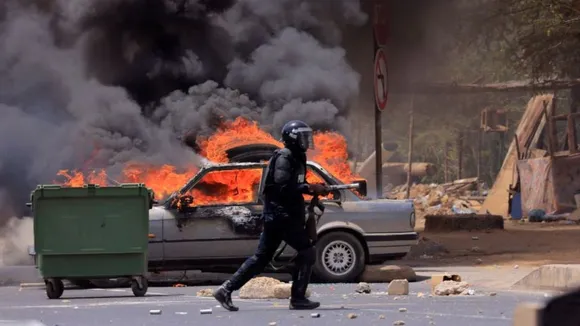 Clashes in Senegal leave at least 9 dead; government bans use of social media platforms