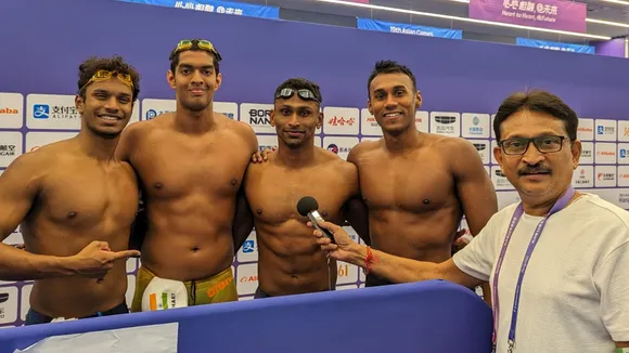 Men's 4x100m medley team smashes national record; advances to final