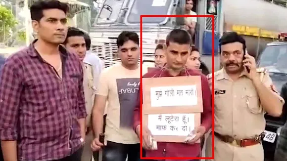 'Don't shoot me': Man with placard around neck surrenders before police in UP