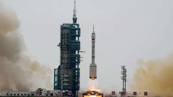 China successfully launches new manned spaceship with first civilian on board