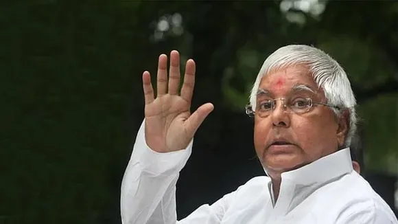 Lalu slams Modi for not reining BJP leaders who speak of changing Constitution