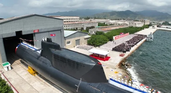 North Korea says it has launched a new nuclear attack submarine to counter US naval power