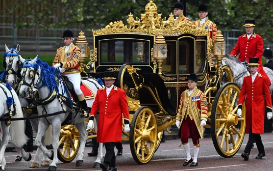King Charles III and queen consort Camilla travel in modern horse-drawn carriage for coronation