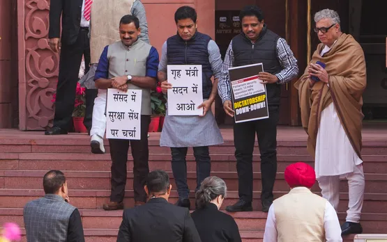 Some suspended LS MPs protest with placards on steps of Parliament