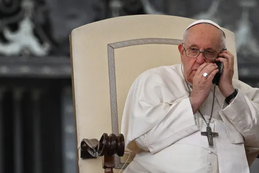 Pope takes cellphone call during general audience, meets with clergy abuse survivors