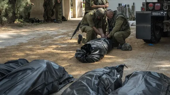 "It's not a battlefield. It's a massacre," says Israeli Major showing dead bodies to journalists