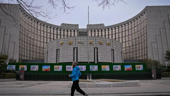 China cuts key interest rate in latest move to boost its ailing property sector