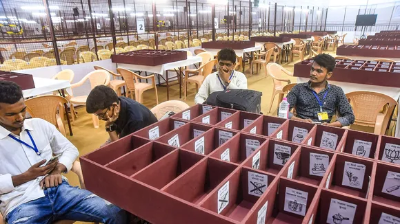 Polling officials at counting centre, a day before counting of votes for the Lok Sabha elections, in Mumbai, Monday, June 3, 2024