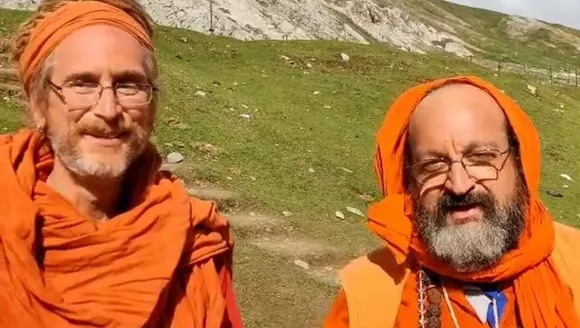 American devotees of Lord Shiva pay obeisance at Amarnath cave shrine in J&K