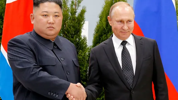 North Korea fires two missiles into the sea as Kim Jong Un travels in Russia for meeting with Putin