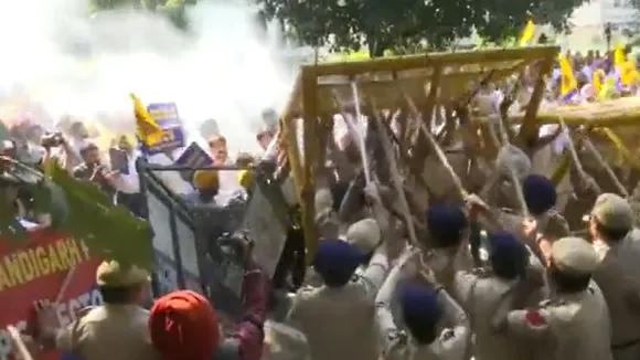 Police use water cannon, lob tear gas shells to disperse AAP workers in Chandigarh