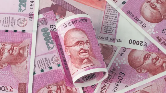 Rupee gains 21 paise to 82.62 against US dollar