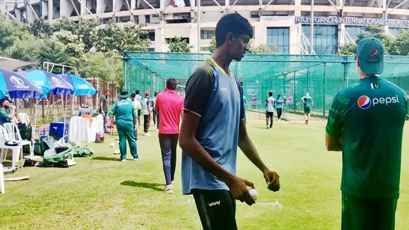 Six feet nine inches tall, net bowler Nishanth Saranu stands out in Pakistan training session