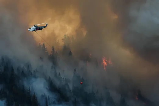 Growing wildfire in central Washington prompts evacuations, threatens homes and farms