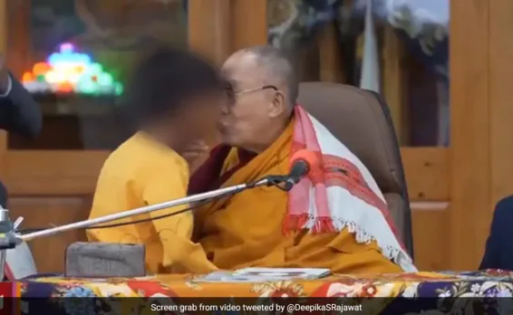 Dalai lama Kisses boy