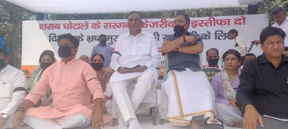 BJP demands Arvind Kejriwal's resignation over liquor scam, leaders stage sit-in at Rajghat