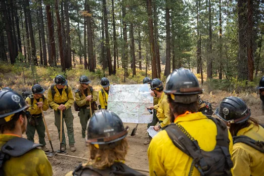 Yellow jerseys of the fireline: A day fighting wildfires can require as much endurance as riding the Tour de France