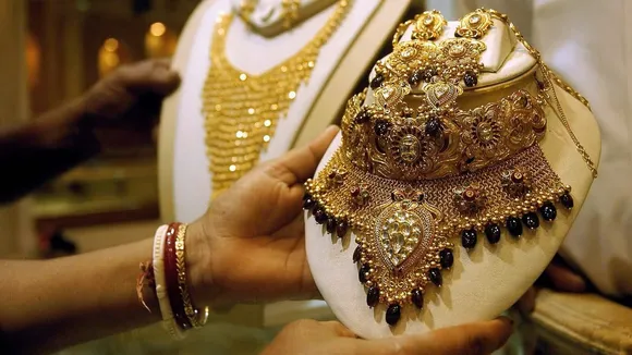 Gold jumps Rs 350 to hit fresh record high of Rs 71,700 per 10 grams