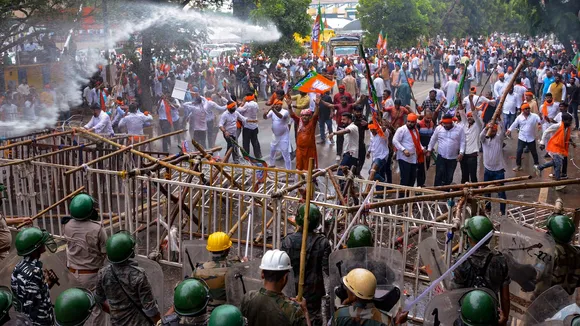Security personnel use water cannons to disperse a gathering of Bharatiya Janata Yuva Morcha (BJYM) workers during Yuva Aakrosh Rally, in Ranchi, Friday, Aug. 23, 2024.