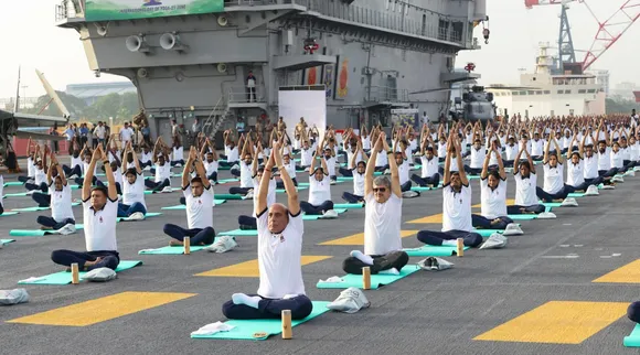 Rajnath Singh participates in yoga celebrations on board INS Vikrant