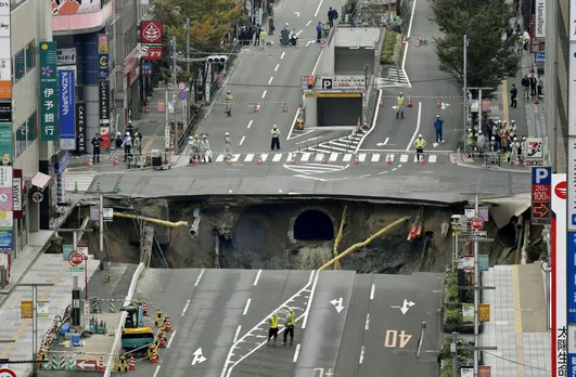 A massive sinkhole is created in the middle of the business district in Fukuoka, southern Japan in 2016.