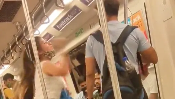 Viral Video of woman repeatedly slapping man in Delhi Metro
