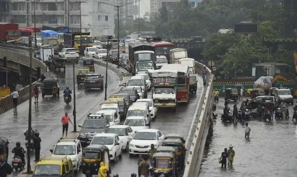 Rains subside in Mumbai, transport services 'normal'; IMD's red alert warns of 'extremely heavy' rains at isolated places