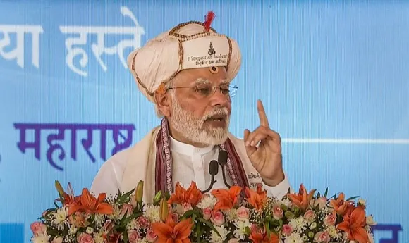 Prime Minister Narendra Modi speaks during a visit to the Sant Tukaram temple in Dehu, in Pune
