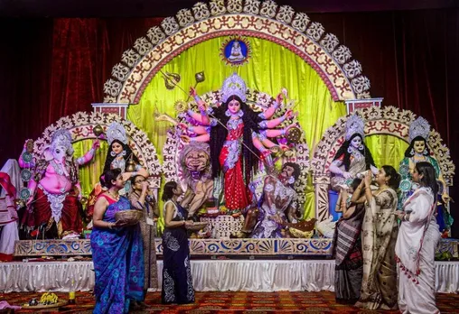 Durga Puja ritualsâ Ashtami begins with Pushpanjali, Kumar Puja amid rains