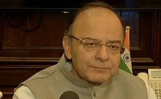 Union Finance Minister Arun Jaitley slips while boarding chopper