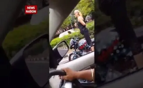 Watch | Chandigarh: Girl doing bike stunts on road, video goes viral on social sites