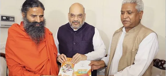 Sampark for Samarthan: Amit Shah meets Ramdev, former CJI Ramesh Chandra Lahoti