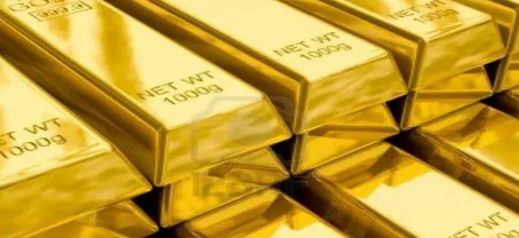 Gold dips on low demand, global cues