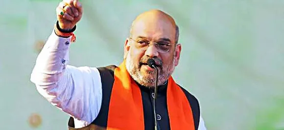 People suffering, Karnataka government busy with Cabinet expansion: Amit Shah