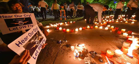 Jet Airways employees take out candle march near Jantar Mantar, appeal to lenders to 'save' airline