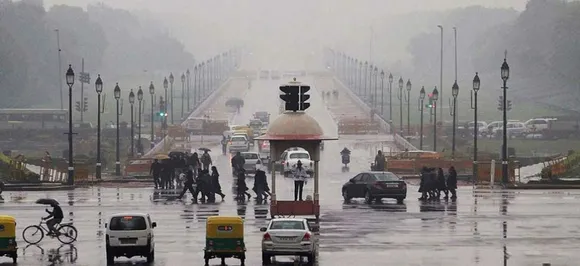 Light rains, cold breeze bring respite from scorching heat in Delhi