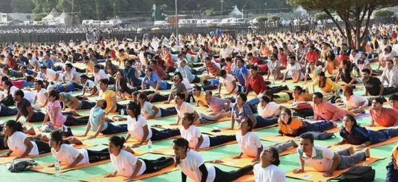 Yoga wave sweeps Washington, record 2,500 register for event 