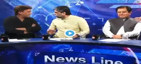 WATCH: Pakistan politician roughs up journalist during live television debate