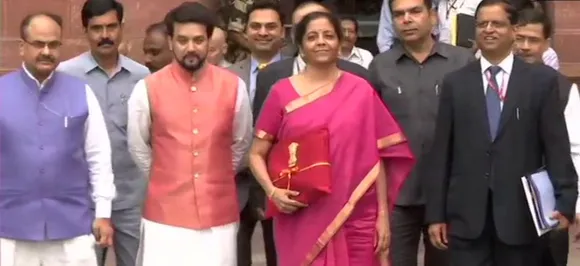 Sitharaman junks traditional briefcase, carries Budget files wrapped in red cloth 