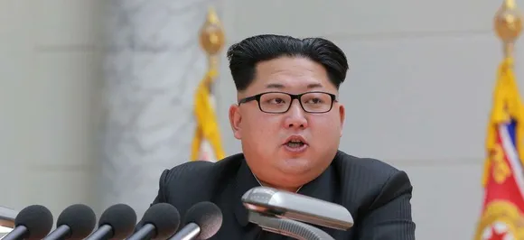 North Koreaâ€™s Kim Jong-un oversees launch of â€˜new weaponâ€™