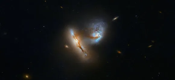 NASAâ€™s Hubble telescope captures spectacular image of two galaxies charging towards each other