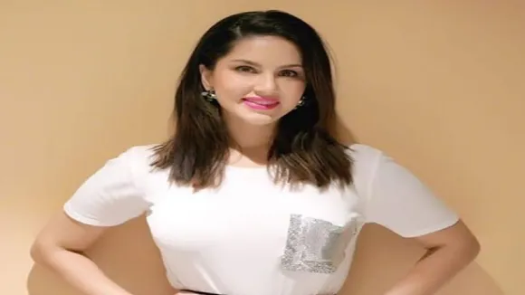 Sunny Leone Ups Glamour Quotient In Plain Tee And Shimmery Skirt, See PHOTOS